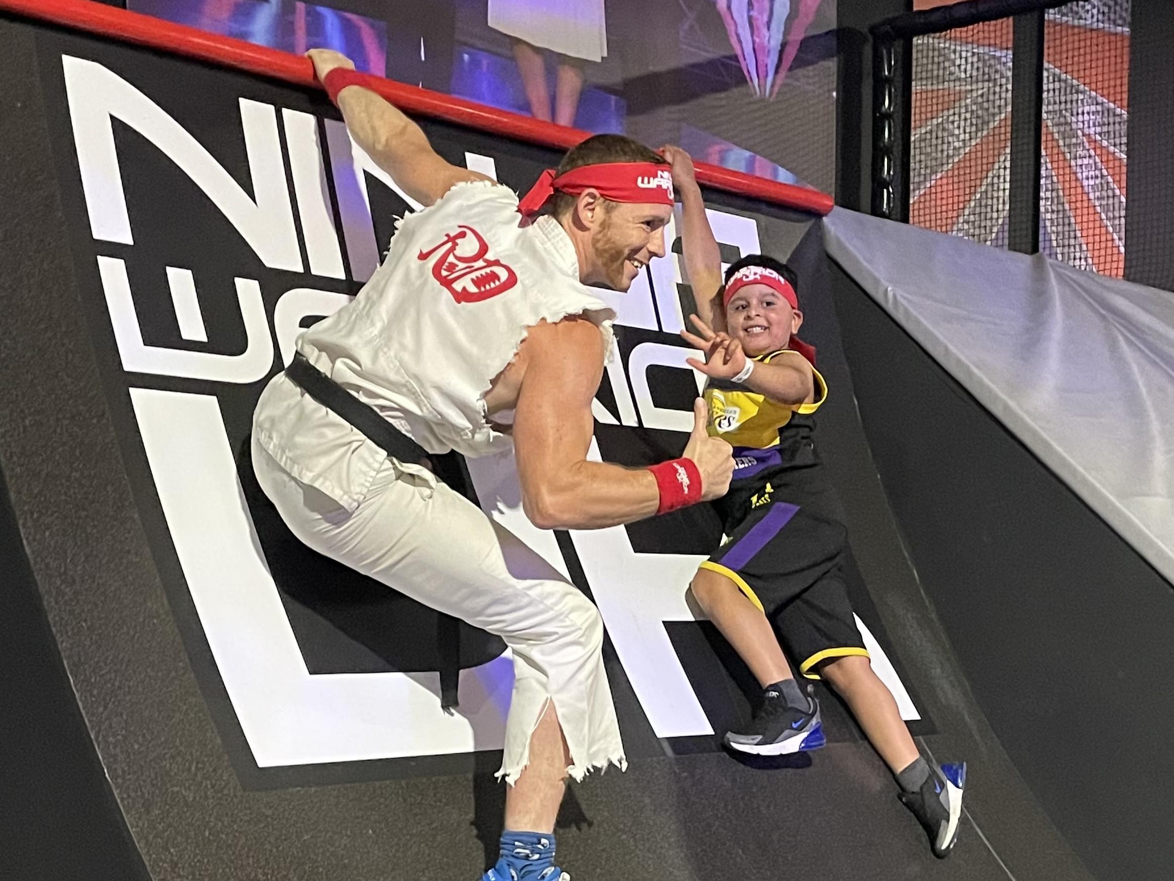 Ninja Sport UK member Dean Cheetham with aspiring Ninja Warrior